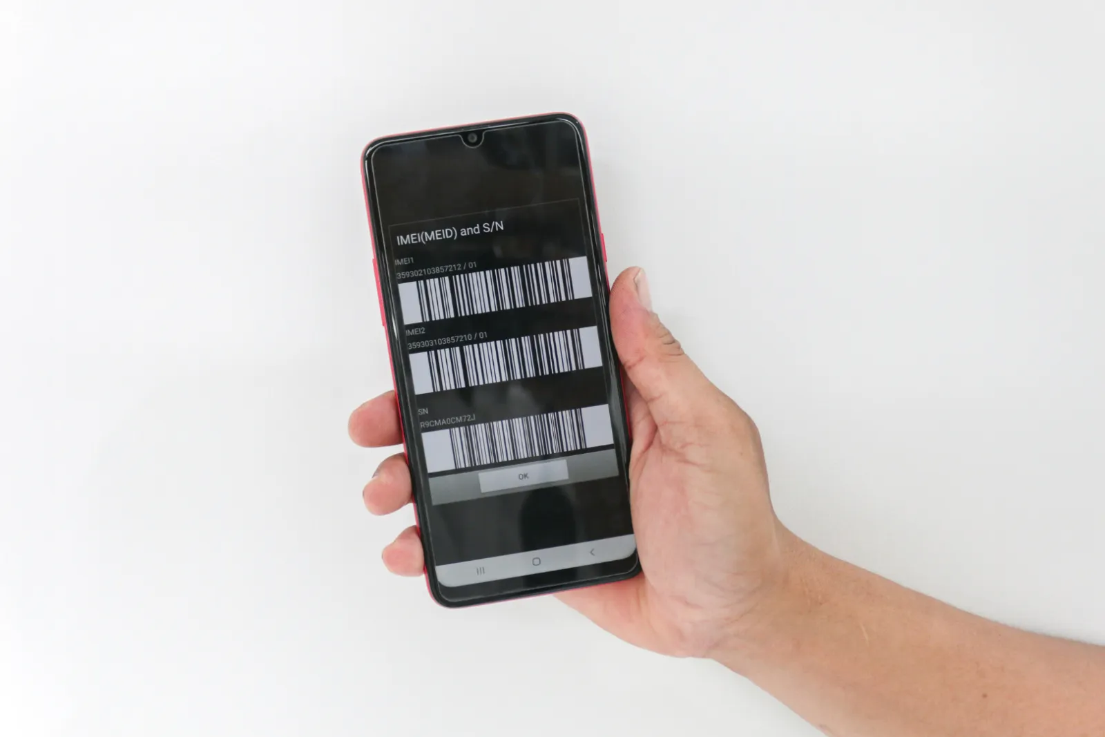 Phone showing IMEI numbers