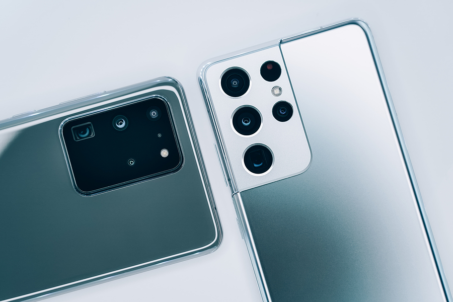Two Samsung Galaxy smartphones lying face down, highlighting rear camera modules and design differences when upgrading to a new galaxy phone in 2026.