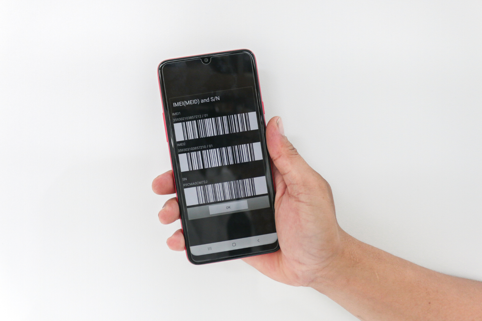 Phone showing IMEI numbers